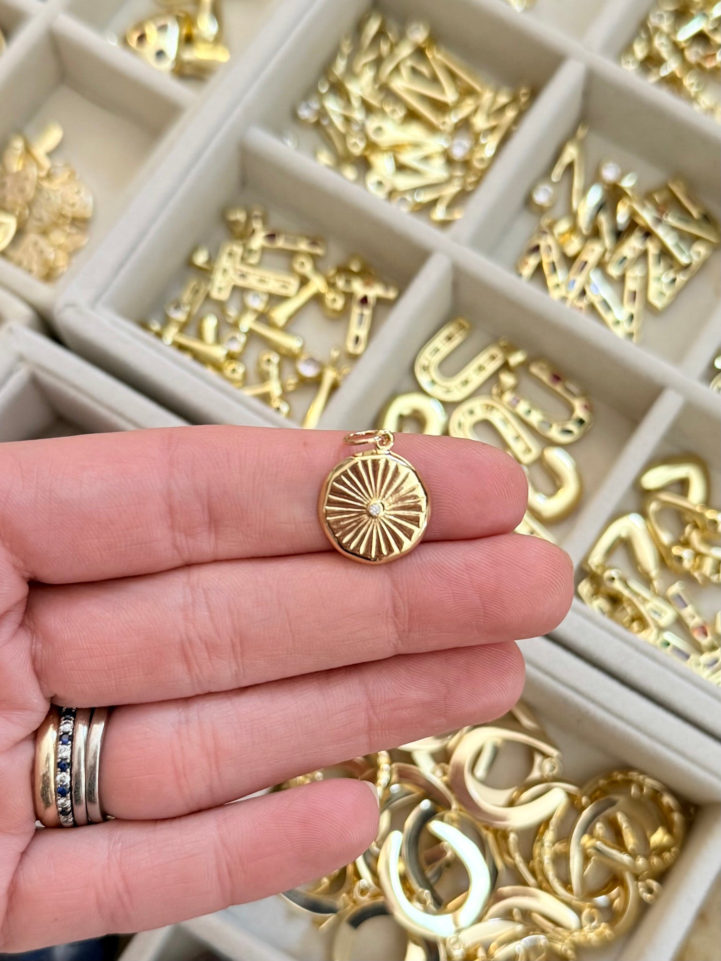 burst medallion charm