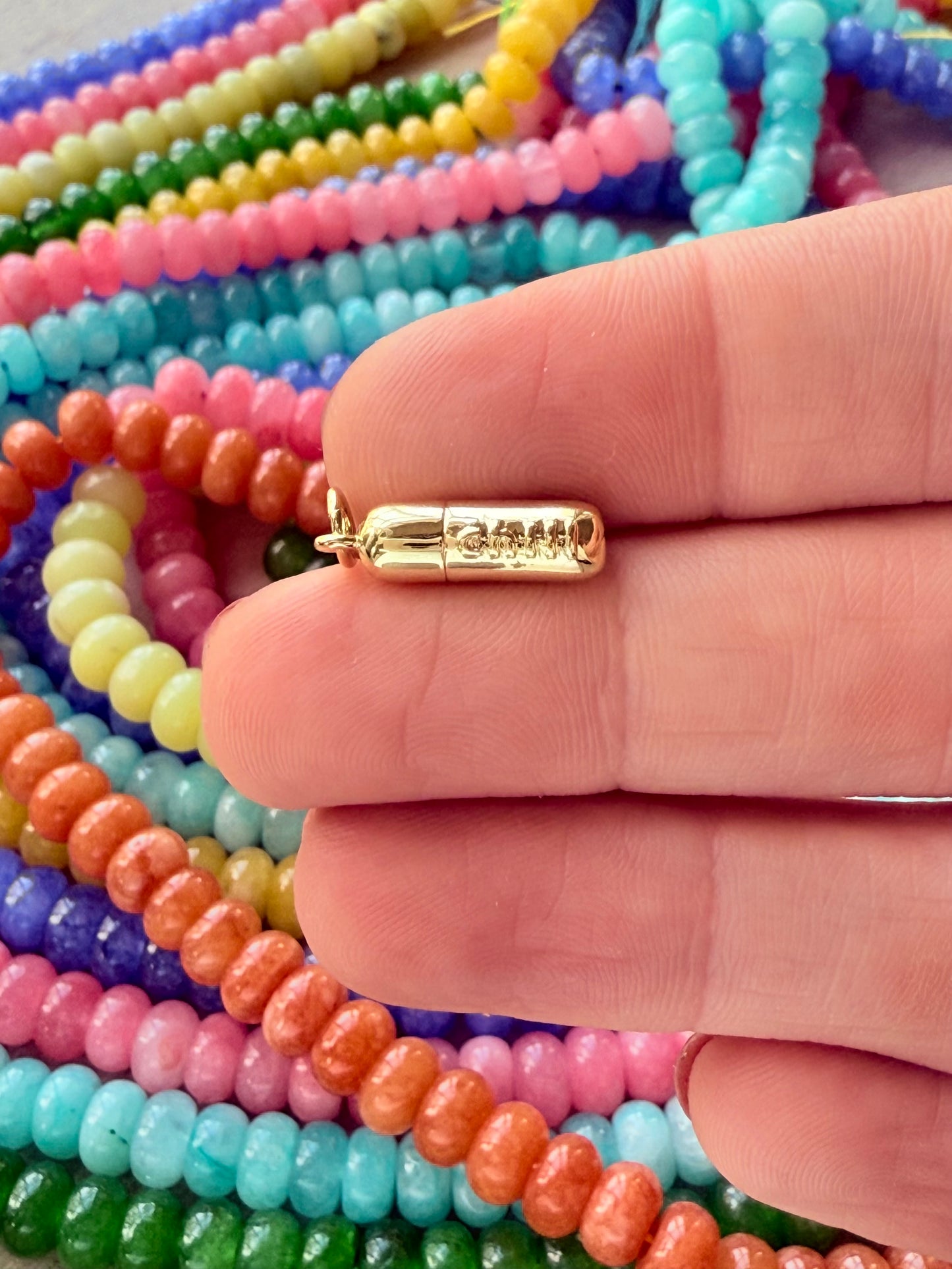 Playful chill pill charm perfect for adding a quirky spin to any necklace.