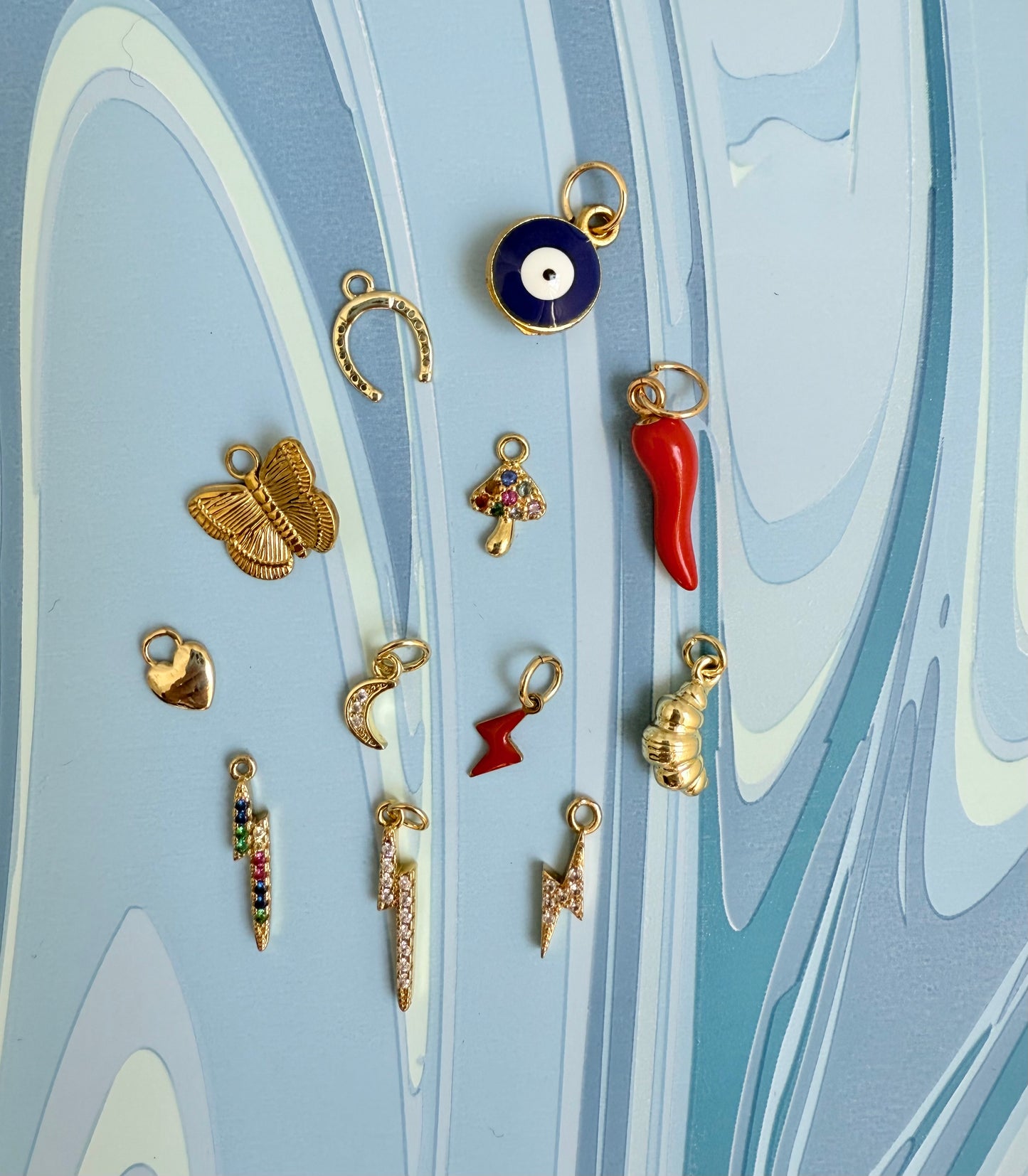 Colorful and stylish add-on charms to personalize your bracelet stack with a unique touch.