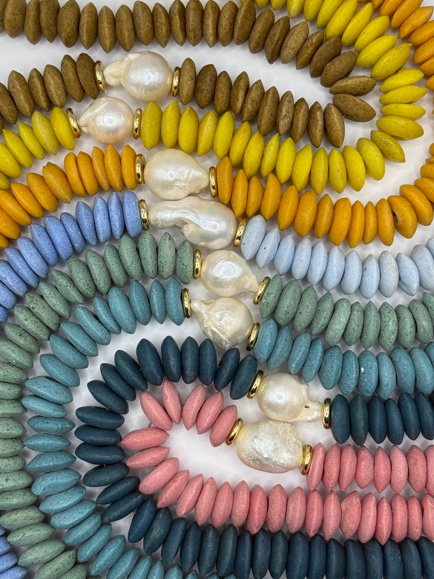 Top-selling jewelry collection featuring popular handmade necklaces and bracelets with unique designs and high-quality materials.