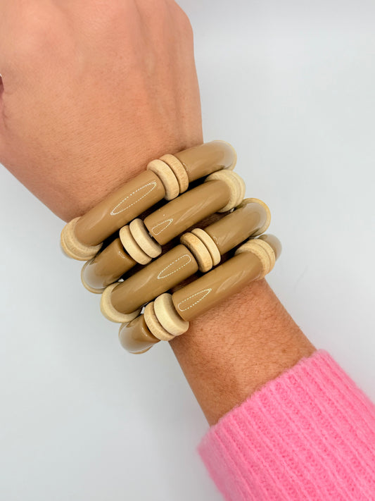 Chic coffee acrylic bracelet stack with rich brown tones, perfect for adding warmth and elegance to any outfit.