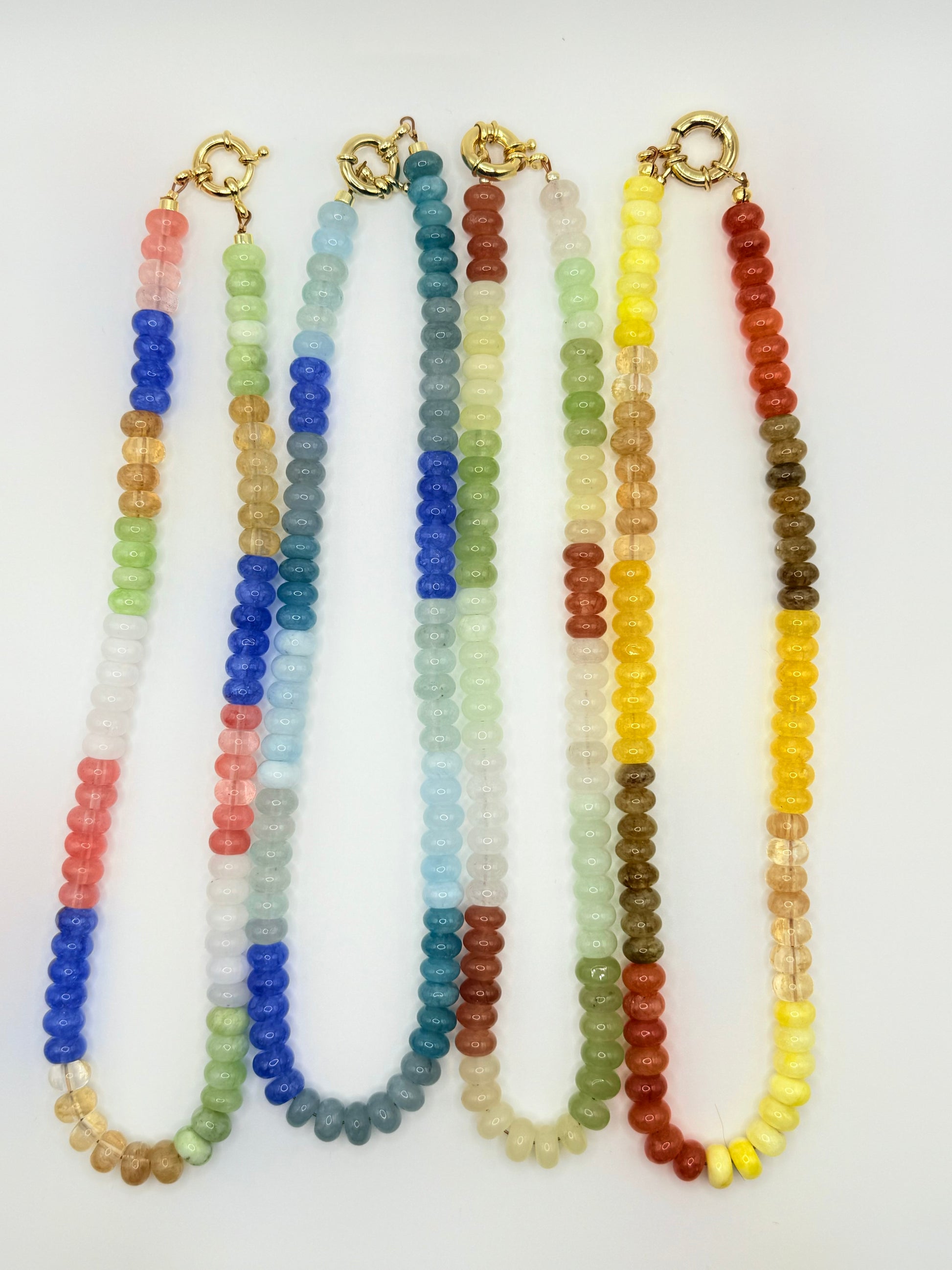 Vibrant colorblock beaded necklaces showcasing a mix of bold colors, perfect for making a stylish statement.