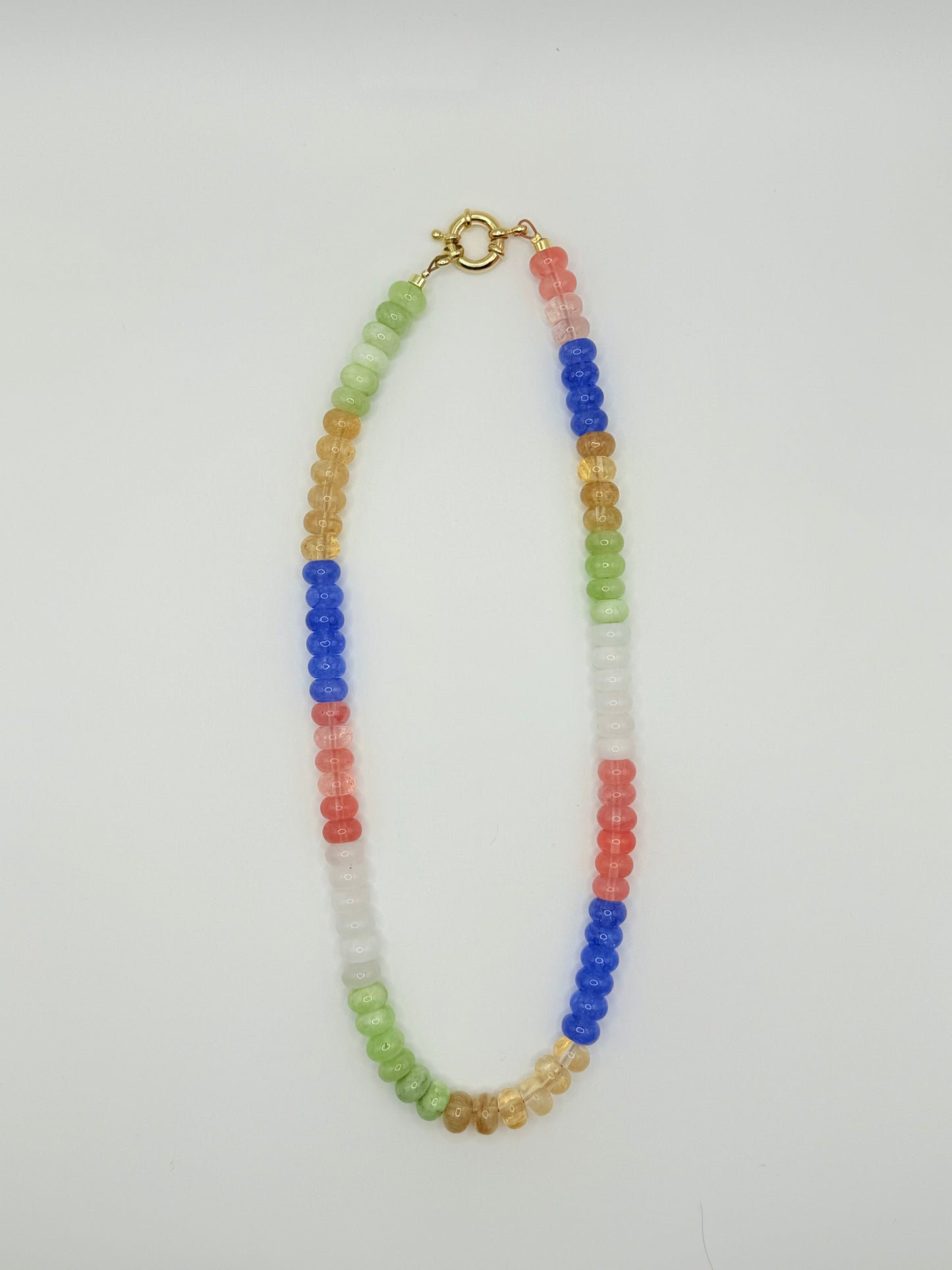 Fashion-forward colorblock beaded necklace with a unique design, adding a pop of color and fun to your accessory collection.