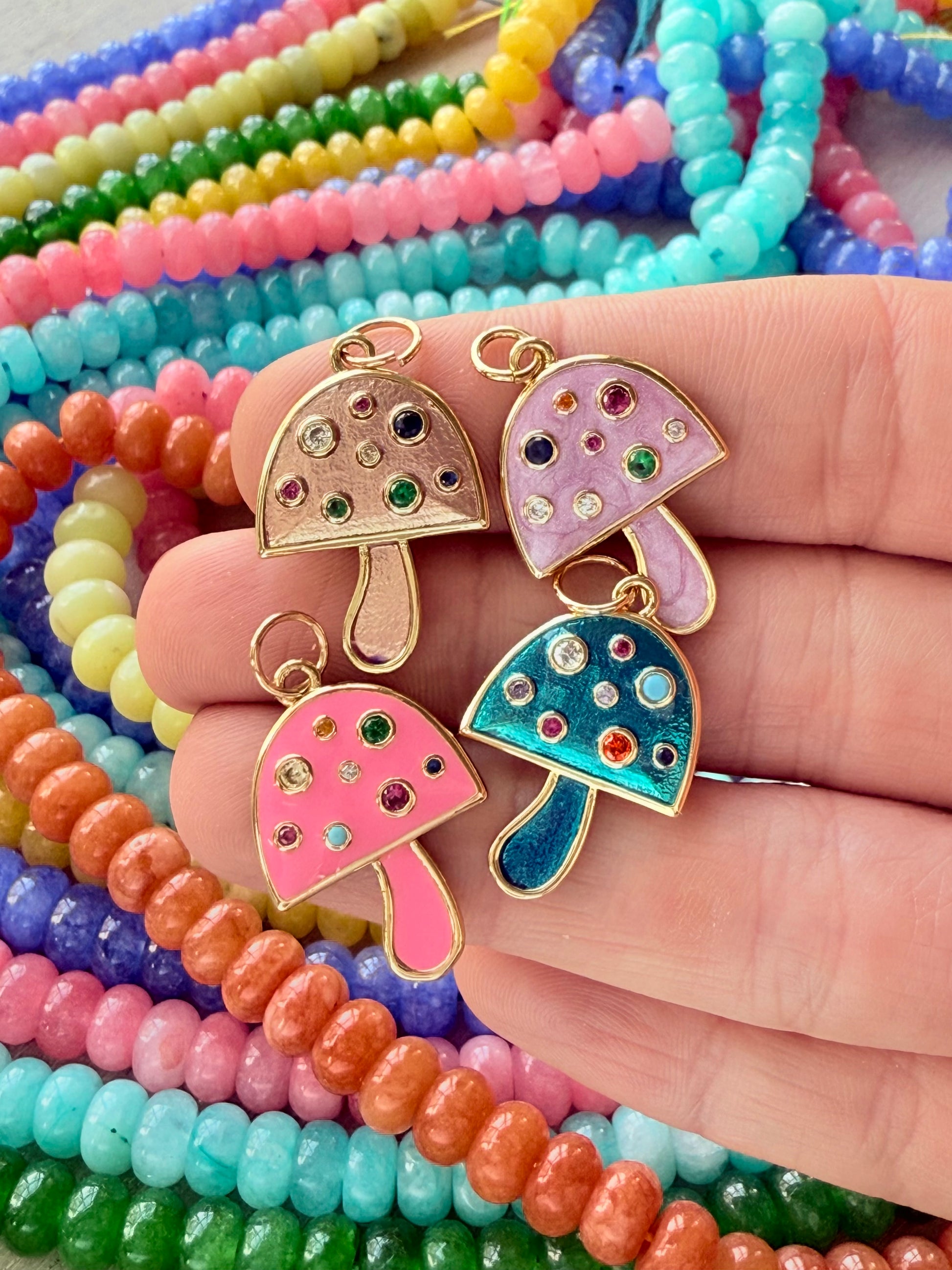 Whimsical mushroom charms with a playful design, perfect for adding a nature-inspired touch to any stack or necklace. 