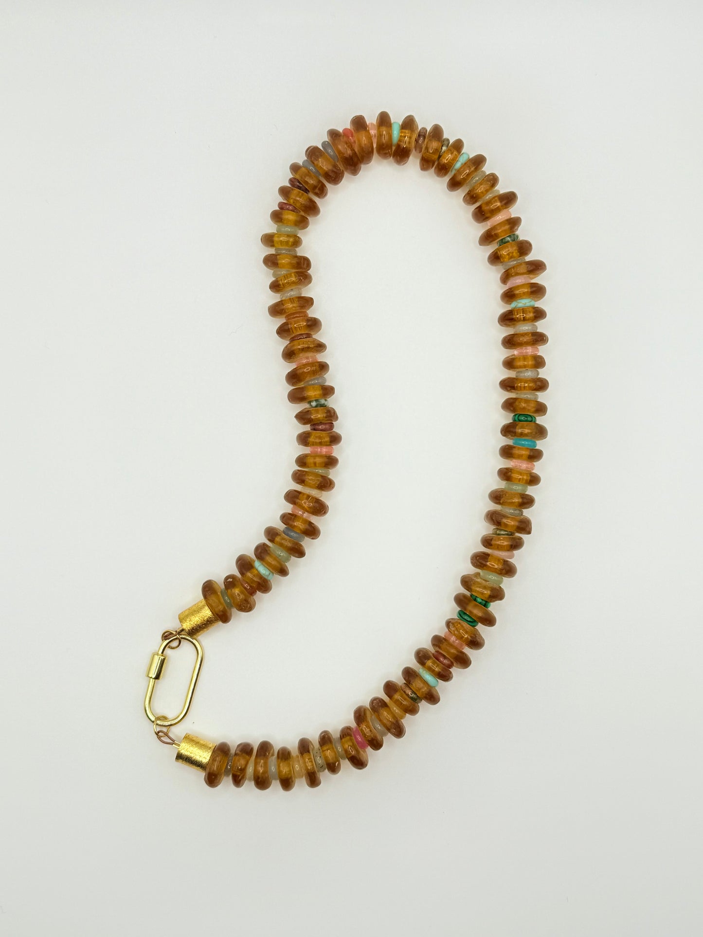 Beautiful caramel beaded necklace with warm, earthy tones, perfect for adding a touch of fun to any outfit.