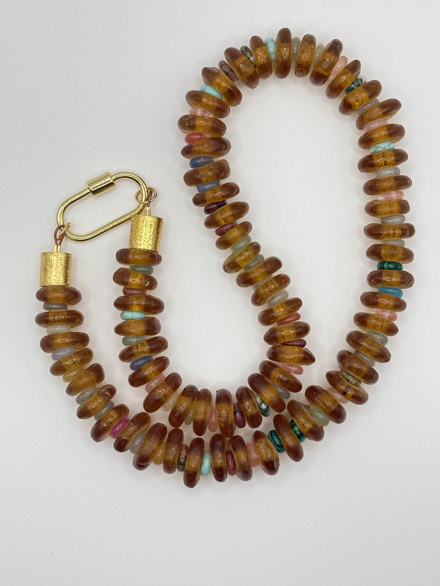 Chunky caramel beaded necklace featuring warm, earthy tones, perfect for adding a natural, stylish touch to any outfit.